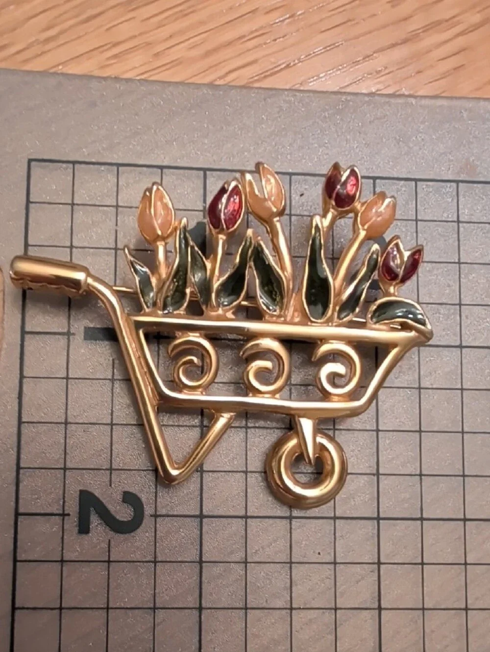 Gold-Tone Wheelbarrow Floral Brooch with Pink & Green Enamel